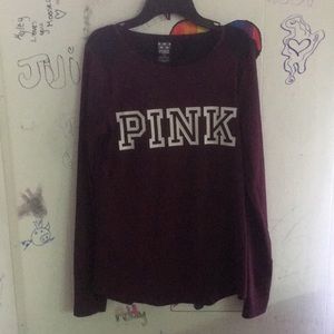 A pink stretchy long sleeved t shirt
